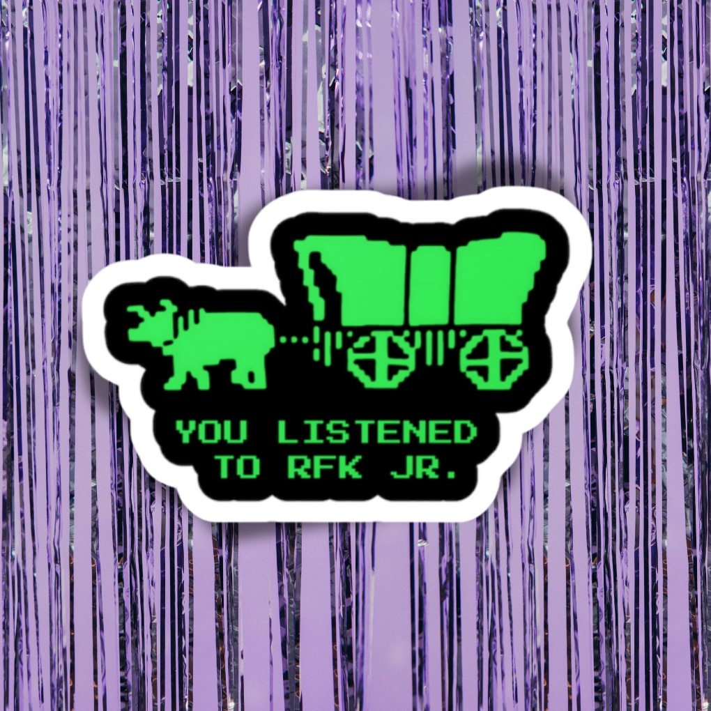 Sticker with a green silhouette of a covered wagon and text on a purple striped background