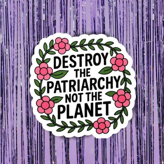Sticker with 'Destroy the Patriarchy Not the Planet' text on a purple background