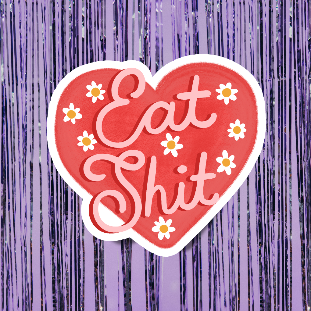 Heart-shaped sticker with 'Eat Shit' text on a purple background