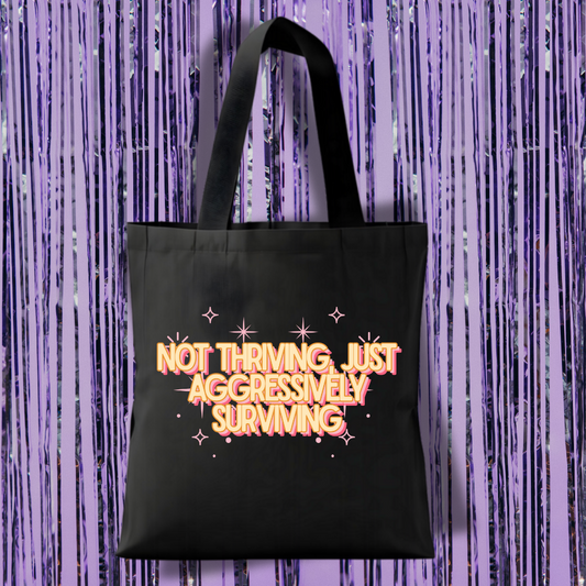 Not Thriving, Just Aggressively Surviving Tote Bag