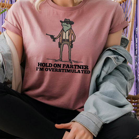 Hold On Partner, I'm Overstimulated Unisex T-Shirt
